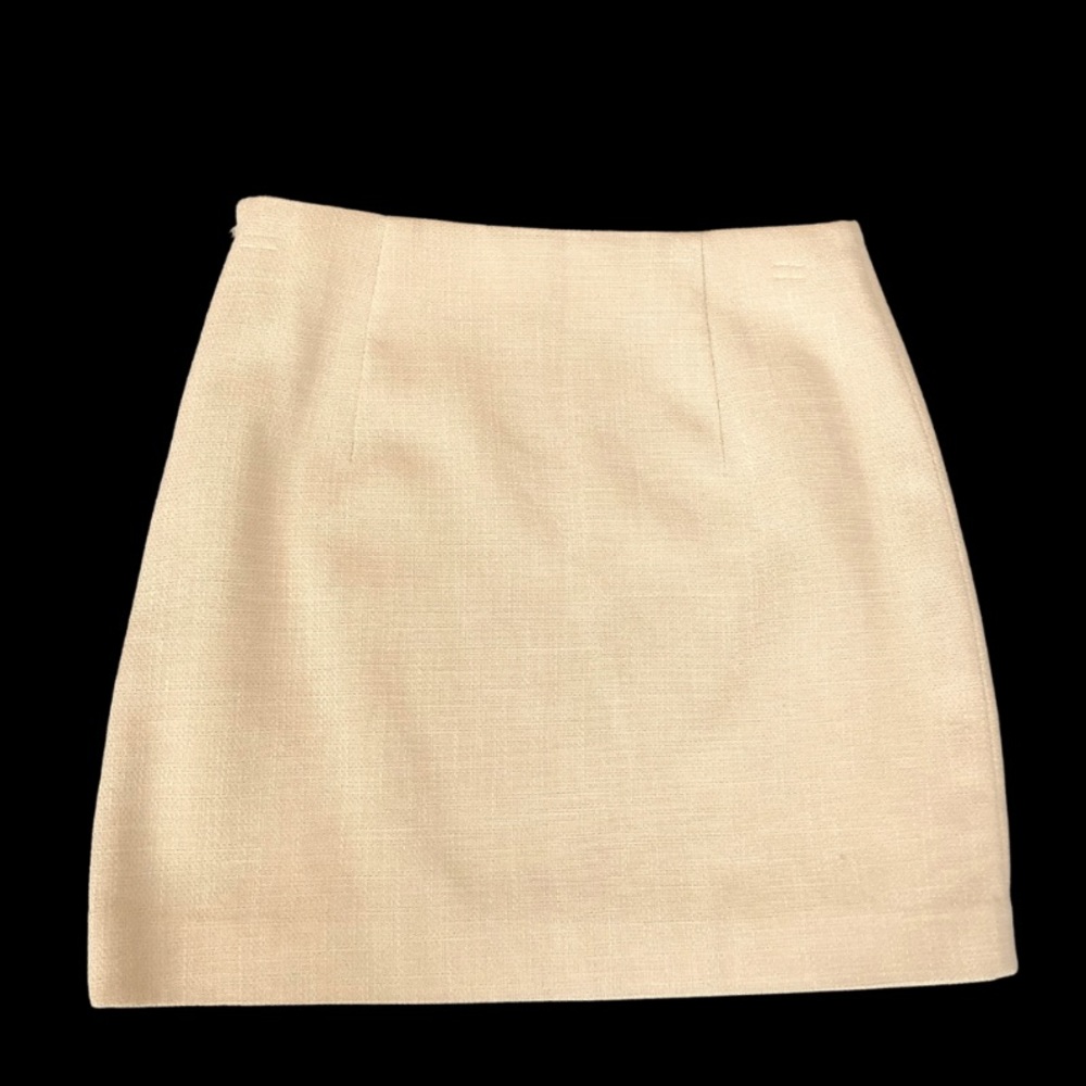 H & M miniskirt, size 4, new without tags.